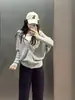 Cárdigan de Punto con Capucha y Mangas Murciélago Estilo Coreano para Mujer Colección Otoño 2026 Diseño de Cremallera Sentido de Diseño Nicho Versátil Sudadera Abrigo