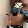 Bolsa bucket de moda transfronteiriça, nova coleção outono 2026, bolsa de ombro versátil para o dia a dia, bolsa tote simples e retrô