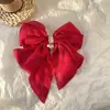 Clip de resorte con lazo de perla, accesorio para el cabello de alta gama, elegante y francés para celebridades de Internet.