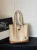 Bolsa de lona de poliéster y algodón de gran capacidad, simple y resistente, nuevo diseño de moda 2026, bolso de hombro texturizado con letras en relieve