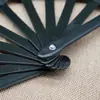 Um pé 33cm preto e branco anel vermelho ventilador preto puro ventilador de kung fu abertura e fechamento suave transfronteiriço leque dobrável antigo
