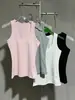 Camiseta sin mangas de punto ajustada con cuello redondo y diseño de nicho, elástica