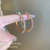 Exquisitos pendientes largos cortos con borlas incrustados de perlas y diamantes para mujer diseño de nicho de lujo ligero pendientes de lazo amor