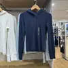 Camiseta de punto acanalado para mujer con capucha, manga larga, corte ajustado, de un solo pecho, cuello semiabierto, camiseta básica casual, nuevo modelo de otoño 488298