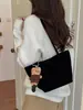Bolsa de bowling coreana de nicho em formato de coração para mulheres, nova bolsa tote transversal simples e versátil 2026, bolsa de mão para o dia a dia