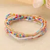 Europa y Estados Unidos pulsera estilo ins transfronteriza diseño de personalidad alta gama cuentas de arroz multicapa apilada pulsera para mujer pulsera para mujer venta al por mayor