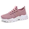 Zapatos de mujer, estilo versátil de primavera, zapatillas transfronterizas de talla grande, zapatos de malla tejida fly-knit, zapatos ligeros y cómodos de suela gruesa, zapatos de un solo color