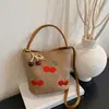Bolso de Mano de Oficina Transfronterizo de Nicho Súper Popular para Mujer Modelo Nuevo 2026 Bolso Cruzado Tipo Cubo Exquisito y Elegante