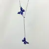 Collar punk de mariposa apilada de chica hot europea y americana, cadena para la clavícula con borlas multicapa de nicho