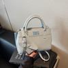 Bolso de mano de alta gama con textura de nicho para mujer, primavera 2025, nuevo bolso de mano para ir al trabajo, moderno bolso bandolera combinable con todo.