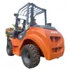 Empilhadeira Personalizada para Terreno Irregular Tração nas Quatro Rodas Empilhadeira Diesel de 3 Toneladas Empilhadeira de Elevação de 5 Toneladas Caminhão de Carregamento e Descarregamento para Obra Empilhadeira Multifuncional
