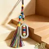 Joia de liga metálica estilo étnico chinês, pingente decorativo de vajra oval giratório, lembrança de viagem atacado
