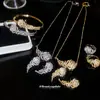 Nuevo Pulsera, Anillo, Pendientes, Collar de Pluma de Zirconia, Conjunto de Joyería de Moda Personalizado, Joyería de Lujo Ligero y de Alta Gama para Mujeres