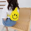 Bolsa de regalo para escuela preescolar viaje de vacaciones Mochila pequeña para niños Bolso de pecho para niña estilo occidental Bolsa para salir cara sonriente de celebridad de internet