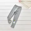 Comercio exterior primavera y otoño leggings de madera para niños bebé pantalones de algodón coreanos pantalones para niños pantalones para niñas