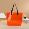 Bolsa tote de gelatina em PVC bolsa tote personalizada de alto padrão bolsa tote de plástico colorida bolsa de compras de grande capacidade bolsa de mão para presente