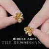 Vintage Light Middle Ancient French Retro Cat's Eye Stone Brincos de flores tridimensionais Light Luxury High-end Brincos Joias para orelha