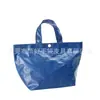 Bolsa de almuerzo tejida de PE nueva y creativa europea y americana, protección ambiental, bolsa de almuerzo portátil tejida de PE multifuncional