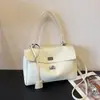 Primavera 2026 Nuevo Estilo Europeo y Americano Simple Gran Capacidad Casual Hebilla de Cierre Bolso Grande de Moda Tendencia Bolso de Hombro Cruzado para Mujer