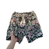 Pantalones cortos de punto con estampado integral de letras para hombre, estilo de verano nuevo, marca de moda, estilo callejero, estilo étnico, casual, versátiles, deportivos, de cinco puntos