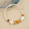 Jingdezhen Navidad Pulsera de Cuerda Trenzada de Cerámica Pulsera de Trébol de Cuatro Hojas Joyería Artística Hecha a Mano Venta al por Mayor Pulseras de Cerámica para Atracciones Turísticas