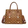 Elegante bolsa feminina 2026 novo modelo para mães de meia-idade, bolsa de mão, bolsa transversal, bolsa feminina estilosa e versátil com padrão clássico