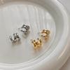 Pendientes de metal de tres anillos estilo frío para mujer, diseño de nicho popular, nuevos y lujosos, ligeros y accesorios para las orejas.
