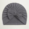 Otoño e invierno europeo y americano nuevo terciopelo alemán para niños gorro suave con lazo para bebé cálido gorro de punto liso sombrero para bebé