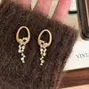 Aretes de Aro Huecos Dorados Cepillados con Diamantes Brillantes y Borlas, Aretes de Lujo de Alta Gama para Mujer con Temperamento Único
