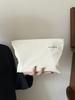 Bolsa de almohada de pana de color liso para otoño e invierno, sencilla y de alta gama, nueva bolsa para cosméticos, bolsa de almacenamiento para el cuidado de la piel.