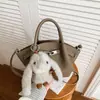 Bolso de Mano Tipo Cubo de Alta Gama Estilo Comercio Exterior para Mujer, Nuevo Bolso de Hombro Casual Vintage Invierno 2026, Bolso Cruzado de Nicho