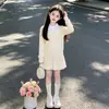Top de punto de imitación de dos piezas para niña, nuevo diseño de principios de otoño 2026, estilo único, combinado con un conjunto de falda