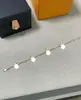 Pulseira de Quatro Flores V-Gold Edição de Luxo Pérola Branca Ouro Rosa Réplica de Luxo Leve Acabamento Fino Moda Feminina Joia Versátil