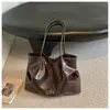 Bolsa tote vintage de grande capacidade para mulheres, novo modelo inverno 2025, bolsa de ombro casual estilosa e moderna estilo coreano