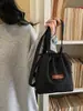 Bolso bandolera de mezclilla vintage casual comercio exterior transfronterizo 2026 nueva moda moderno versátil simple con cordón