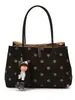 Bolso de mano de lona con lunares de gran capacidad para mujer, nuevo modelo 2026, de alta gama, lujo ligero, bolsa tote de nicho para el trabajo