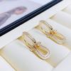 Aretes de lujo ligero europeo y americano con hebilla de herradura de circonita para mujer, aguja de plata s925, moda elegante, de alta gama, estilo estrella