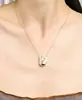 En Stock Bolsita de la Fortuna Estilo Ins Colgante a Cuadros Collar Plateado Cobre Cadena para Clavícula de Diseñador Original de Nicho para Mujeres