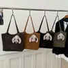 Bolsa Tote Grande Capacidade para o Trabalho para Mulheres 2025 Nova Versátil Moda Design de Nicho Bolsa de Ombro para o Dia a Dia