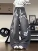 Calça jeans com estampa de corrente, design retrô americano, para homens e mulheres, novo estilo de rua 2026, solta, perna larga, comprimento até o chão