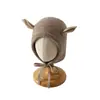 Gorros Infantiles Coreanos Qiunan Invierno Nueva Moda Lindos Tejidos A Prueba de Viento Cálidos Chal Gorro para Bebé Venta al por Mayor