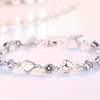 Pulsera de corazón azul transfronteriza Tilani para mujer, pulsera hueca con forma de corazón de amor, chapada en plata, joyería azul para la mano, fabricantes mayoristas en nombre de