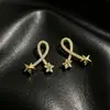Pendientes de botón de cruz de circonita microincrustada, simples de lujo ligero, diseño exquisito de alto temperamento, pendientes de estrella, joyería para orejas para mujer