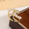 Anillo Exquisito Francés de Doble C con Perlas Set de Dos Piezas Elegante Versátil Zirconia Incrustada Anillo Abierto Ajustable para Mujer