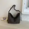 Bolsa de Mão Estampa de Leopardo Feminina 2026 Verão Nova Estilo Coreano Nicho Bolsa Tote para o Dia a Dia Grande Capacidade Ombro Único Transversal Bolsa de Axila