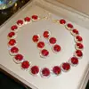 Set de Aretes y Collar de Zirconia Roja en Forma de Gota de Agua Transfronterizo Europeo y Americano, Cadena para Clavícula de Lujo Ligero de Nicho, Set de Joyería de Alta Gama
