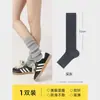 Calcetines de becerro para mujer de otoño e invierno, calentadores de piernas de punto grueso, calcetines versátiles apilables, calentadores de piernas acanalados de doble capa color liso Maillard al por mayor