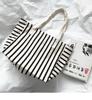 Nuevo bolso de lona a rayas para mujer, bolso de hombro de gran capacidad, bolso escolar para estudiantes, bolso de compras japonés y coreano, bolso de mano