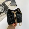 Mini Bolso Cubo de Lunares con Cordón para Mujer 2026 Nuevo Estilo Cadena Metálica Cruzado Pequeño Bolso Moda Combinación Bolso para Teléfono