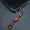 Cadena para teléfono móvil de cinabrio, arena de cristal, llavero con bronceado, corazón, sutra, colgante para bolso, llavero, colgante de la verdad de seis palabras, venta al por mayor